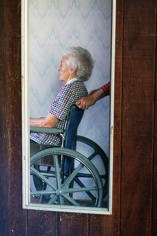 Elderly Woman Being Pushed Photograph By Ron Koeberer Fine Art America