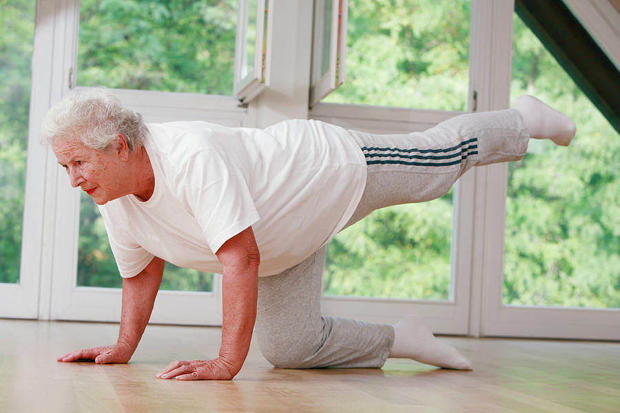 Sports Photograph - Elderly Woman Stretching by Mauro Fermariello/science Photo Library