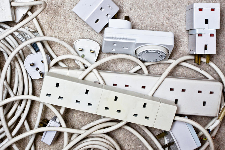 Black And White Photograph - Electric plugs by Tom Gowanlock