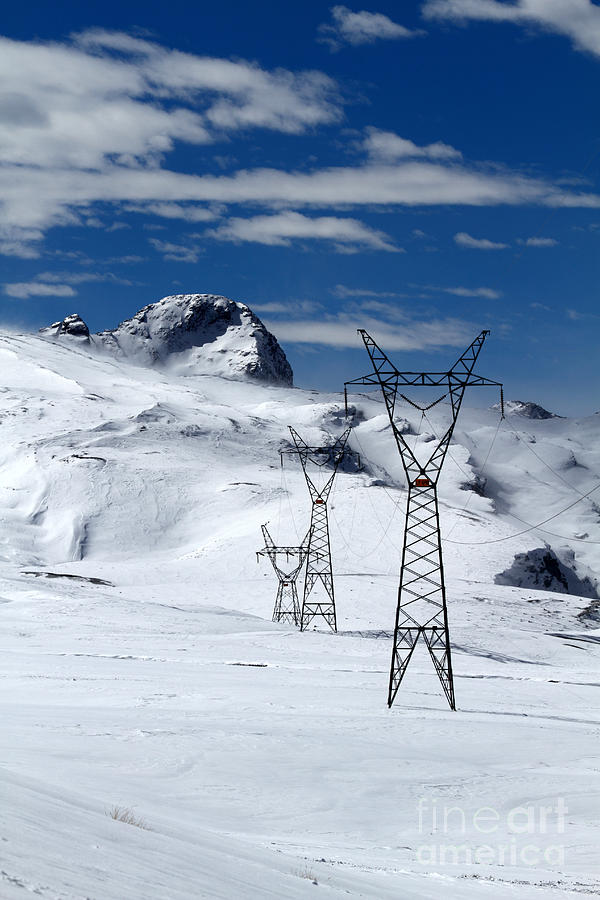 Electricity Pylons in the Snow Photograph by James Brunker