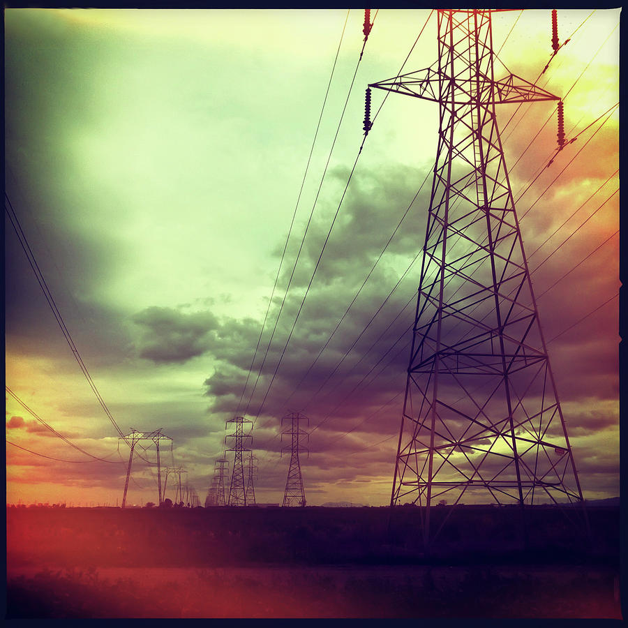 Electricity Pylons Photograph by Mardis Coers