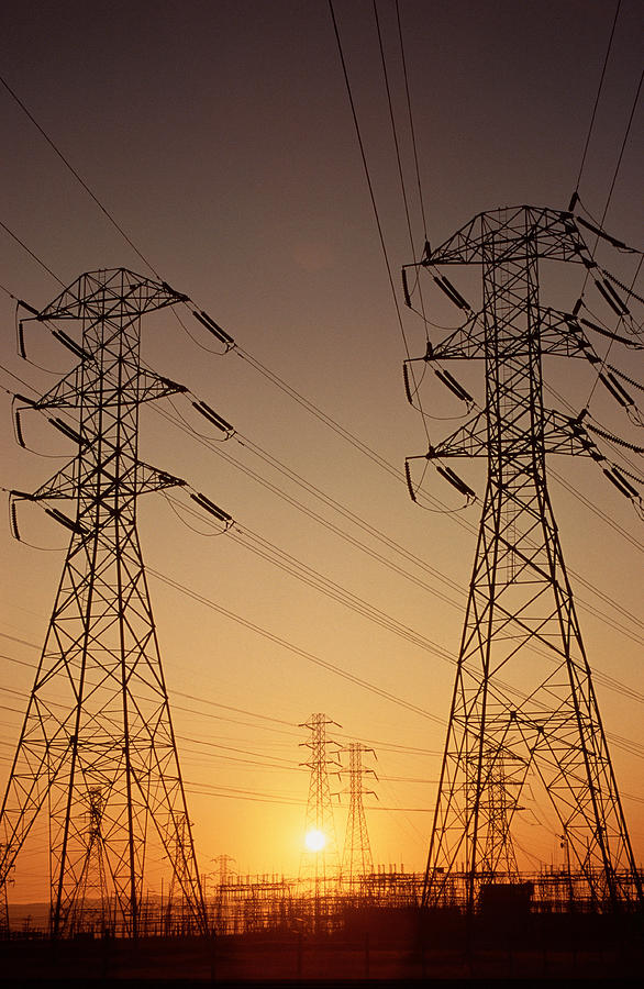 Electricity Pylons Photograph by Richard Hansen