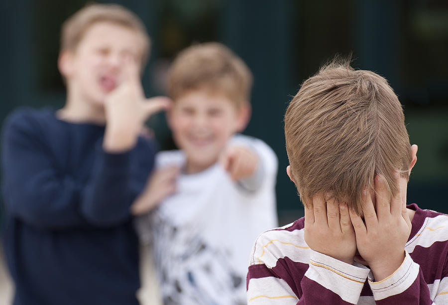 Elementary Student Hides His Face While Being Bullied Photograph by 1MoreCreative