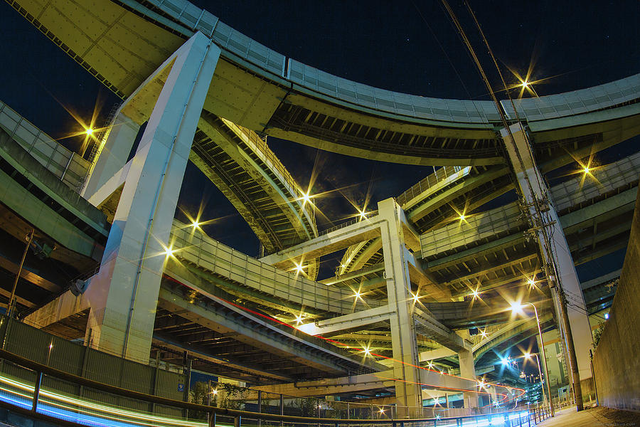 Elevated Highway Intersection At Night Photograph by Sandro Bisaro