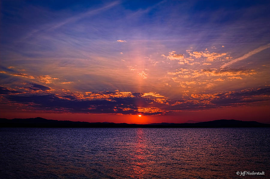Eleven mile sunset Photograph by Jeff Niederstadt