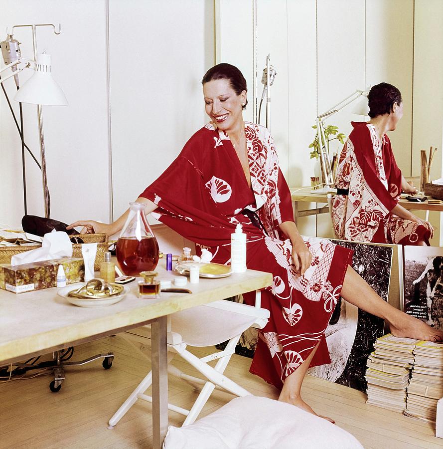 Elsa Peretti Wearing A Red Kimono Photograph by Horst P. Horst
