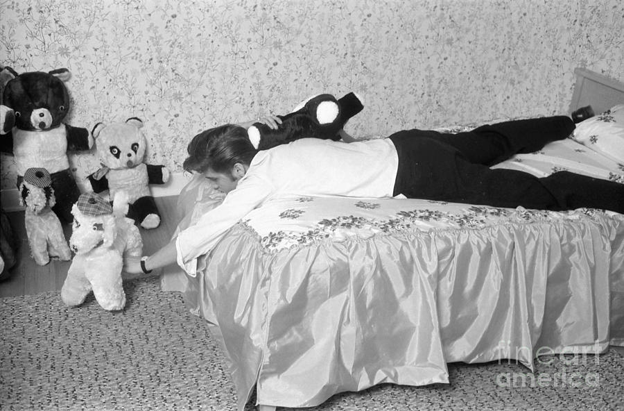 Elvis Presley at home with his teddy bears 1956 Photograph by The Harrington Collection