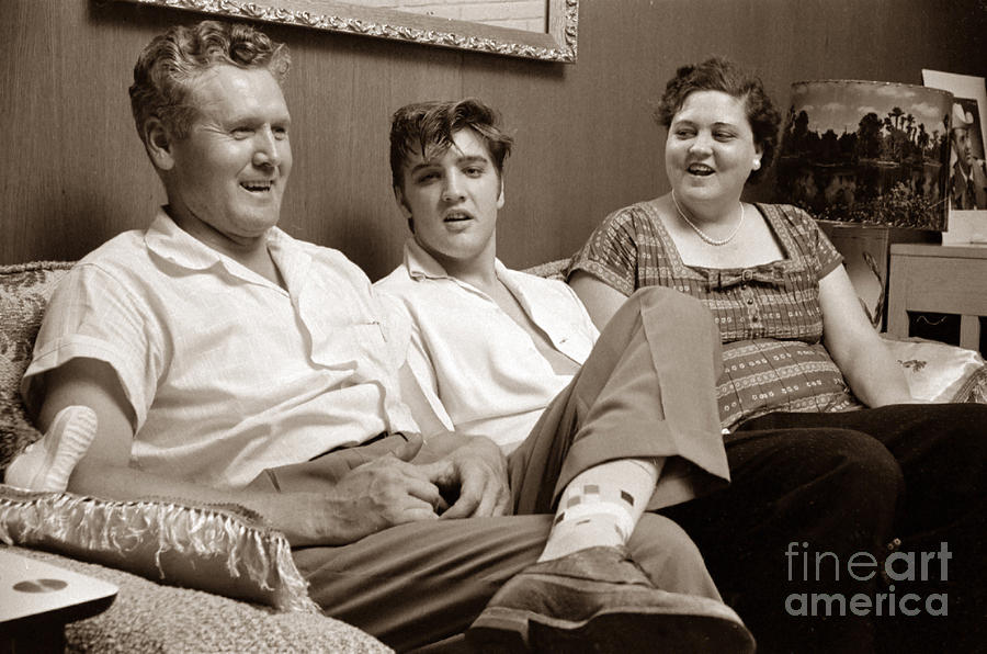 Elvis Presley at home with Vernon and Gladys Sepia Print Photograph by The Harrington Collection