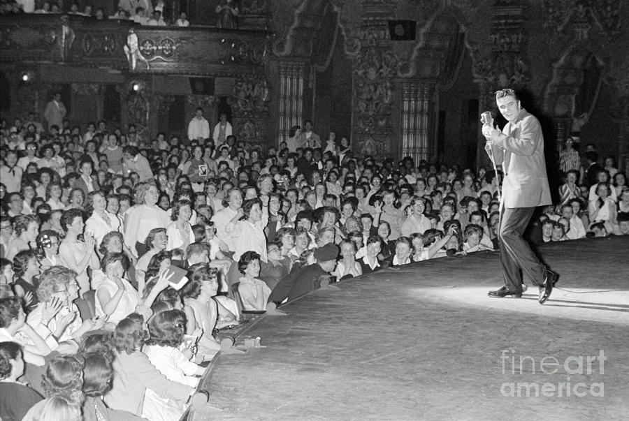 Elvis Presley Photograph - Elvis Presley in concert at the Fox Theater Detroit 1956 by The Harrington Collection