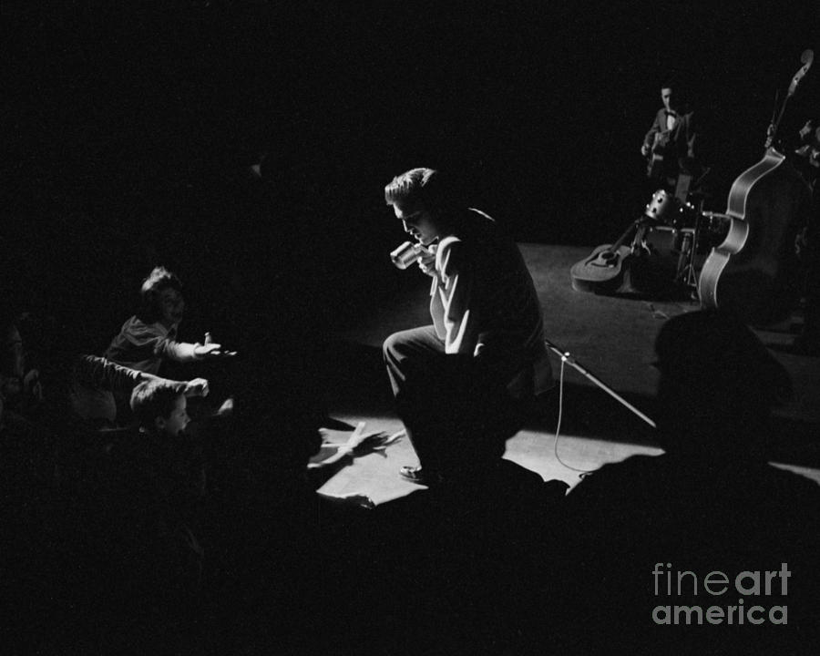 Elvis Presley Photograph - Elvis Presley on stage at the Fox Theater in Detroit 1956 by The Harrington Collection
