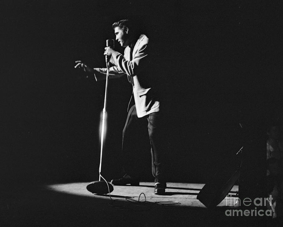 Elvis Presley on stage in Detroit 1956 Photograph by The Harrington Collection
