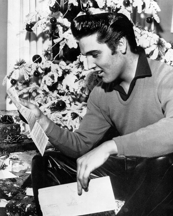 Elvis Presley Photograph - Elvis Presley Reads Letter by Retro Images Archive