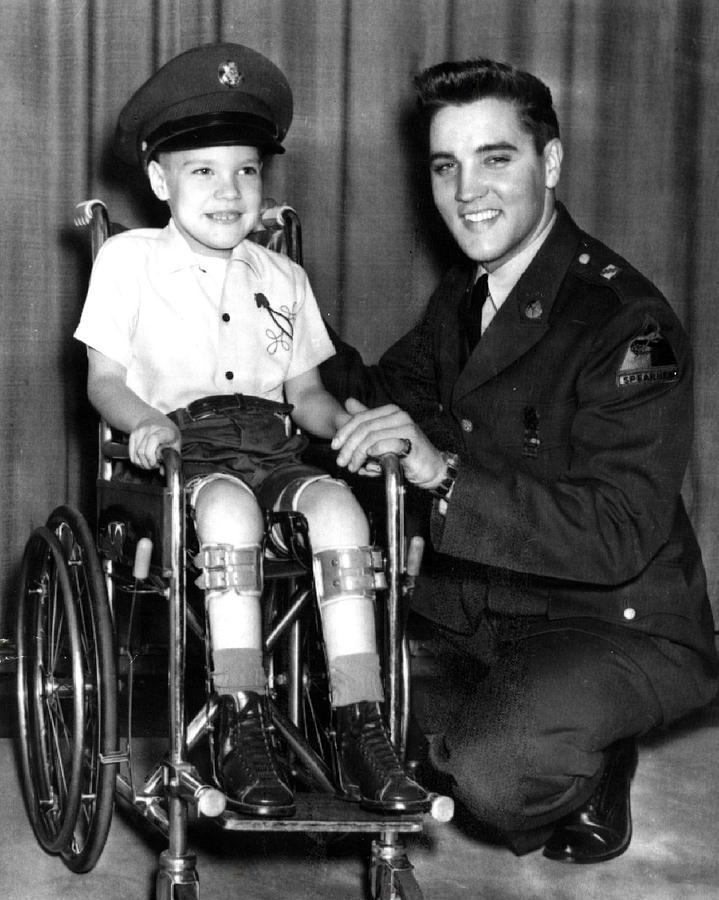 Elvis Presley Photograph - Elvis Presley Takes Time With Boy by Retro Images Archive