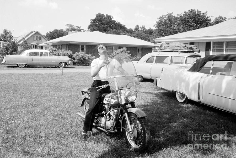 Elvis Presley with his 1956 Harley KH by The Harrington Collection