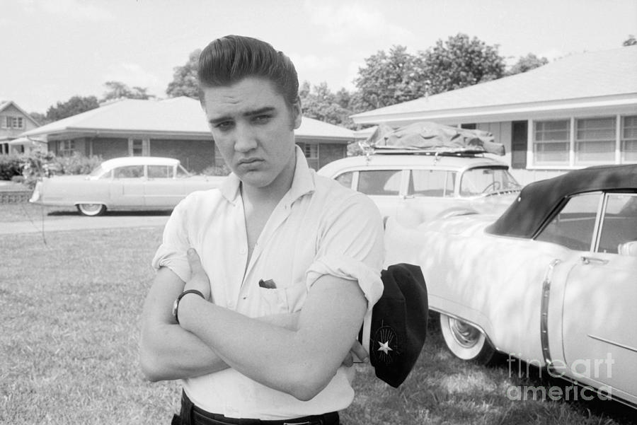 Elvis Presley Photograph - Elvis Presley with his Cadillacs 1956 by The Harrington Collection