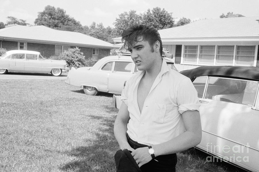 Elvis Presley Photograph - Elvis Presley with his Cadillacs by The Harrington Collection