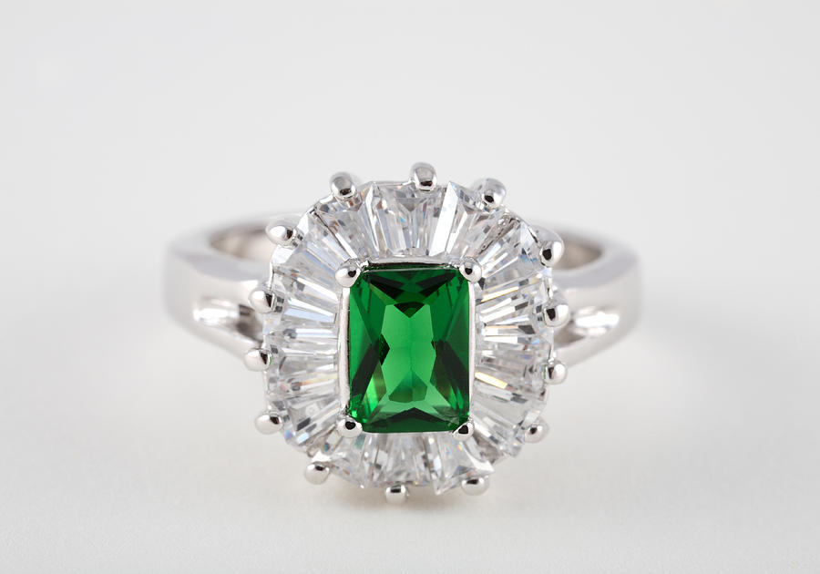 Emerald diamond ring on white background Photograph by ProArtWork