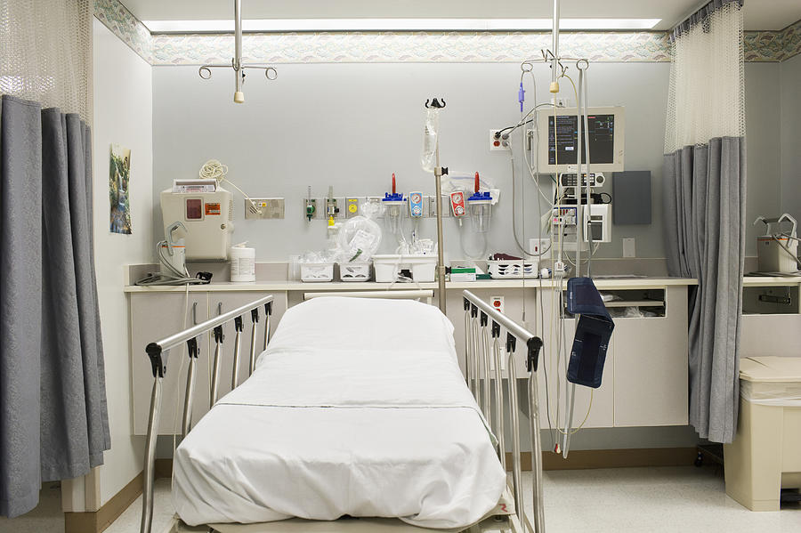 Empty hospital bed in emergency room Photograph by ER Productions Limited