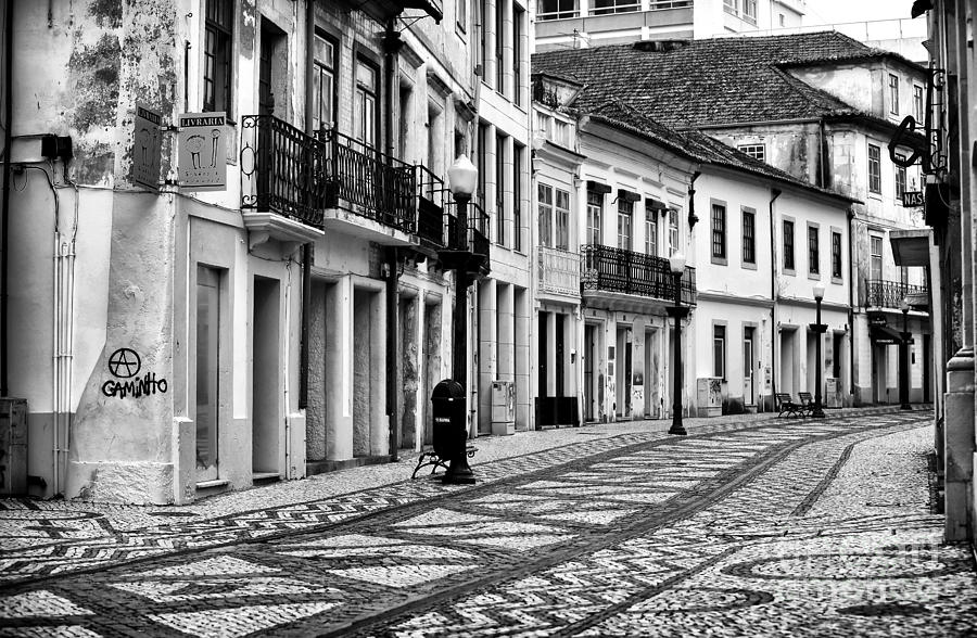 Empty in Aveiro Photograph by John Rizzuto