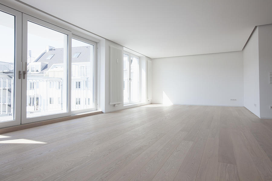 Empty living room in modern apartment Photograph by Westend61