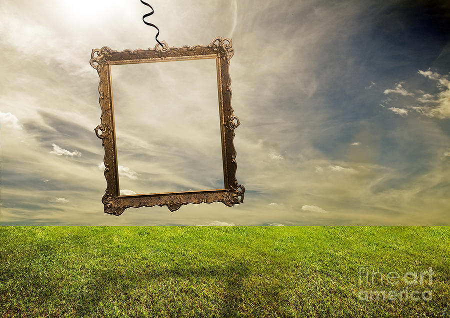 Spring Photograph - Empty retro frame hanging on poor land by Michal Bednarek