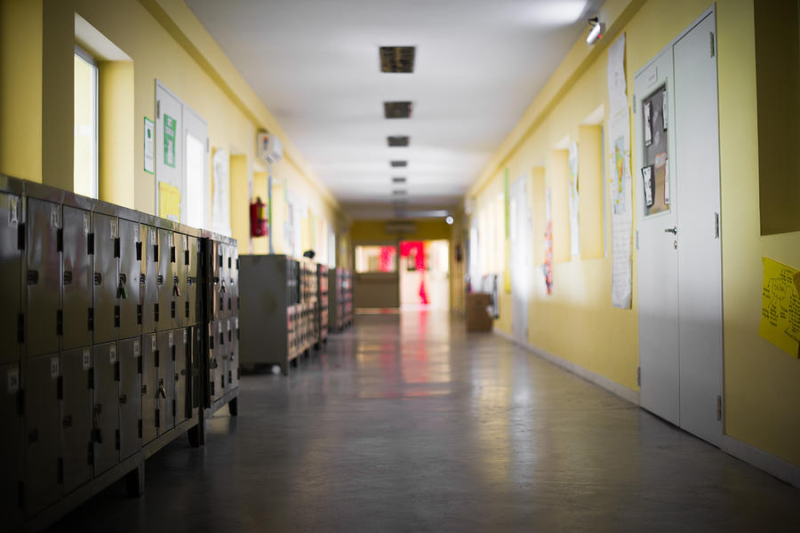 Empty school corridor Photograph by PhotoAlto/Frederic Cirou