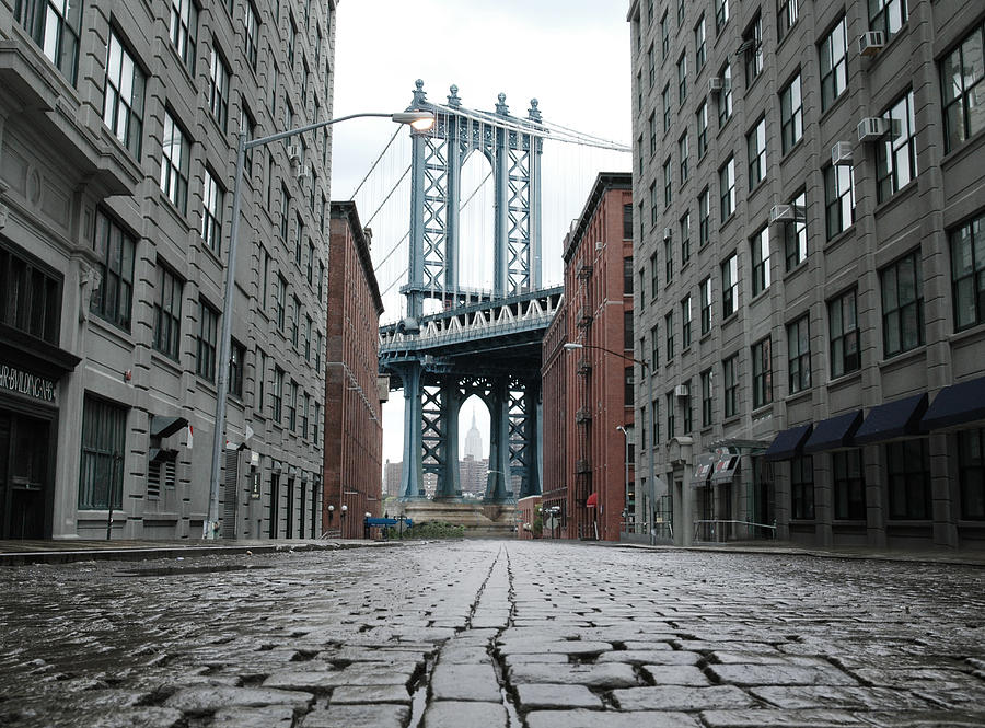 Empty street and Brooklyn bridge Photograph by Miguel Navarro