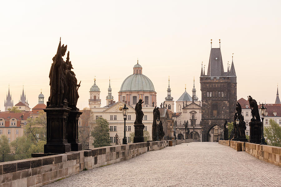 Emtpy Charles Bridge with no people early in the morning, Prague, Czech Republic Photograph by Alexander Spatari