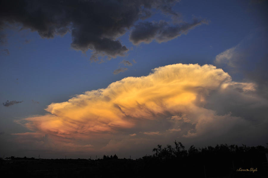 End of Day Storm Photograph by Karen Slagle