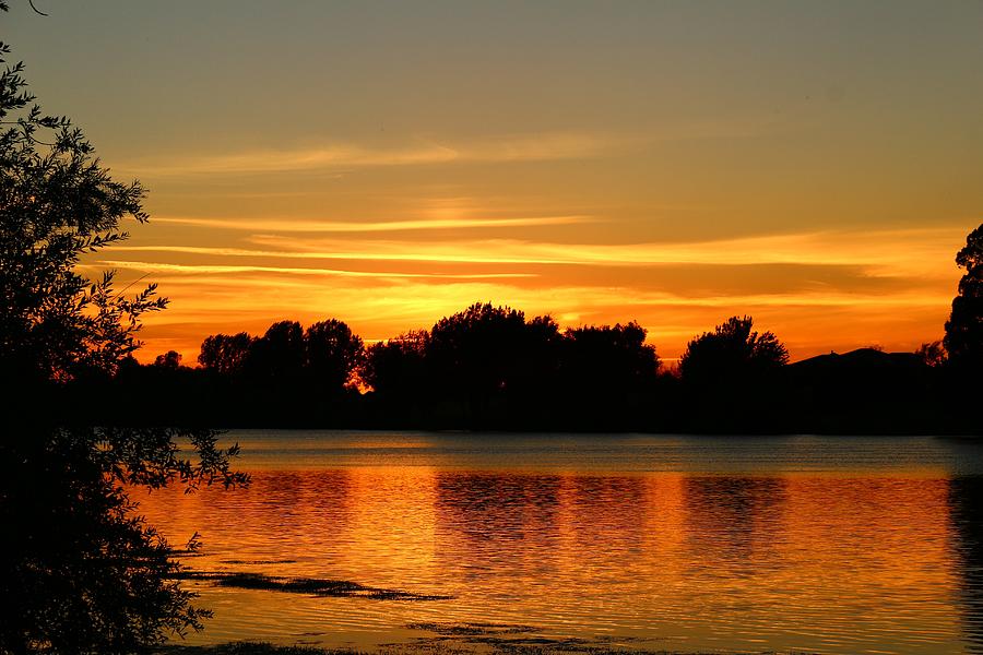 End of summer sunset Photograph by Lynn Hopwood
