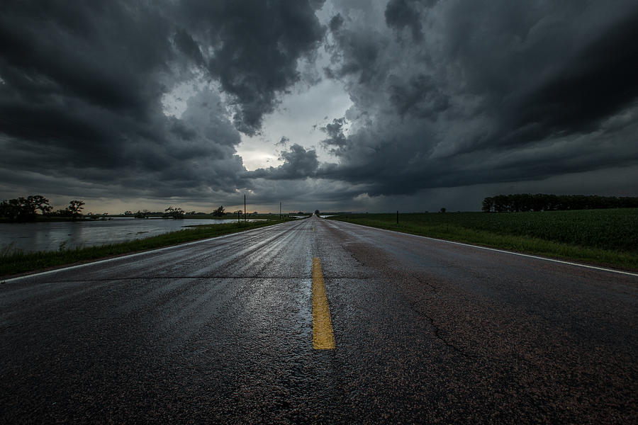 Storms Photograph - End of the Road by Aaron J Groen