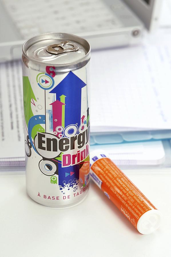Still Life Photograph - Energy drink and vitamin pills by Science Photo Library