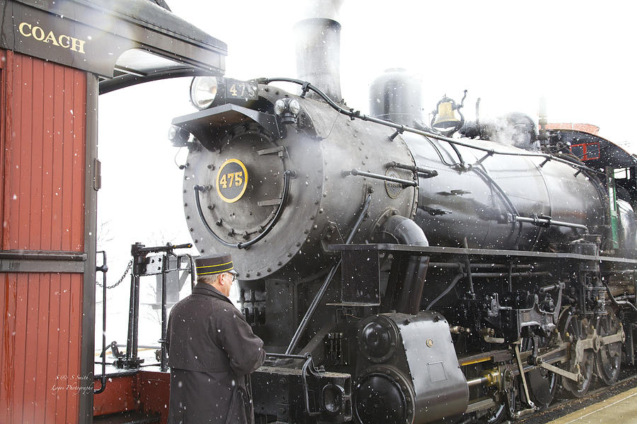 Engine 475 with conductor in snow Photograph by Steve and Sharon Smith