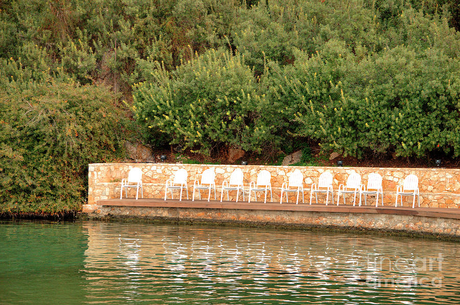Epidavros Resort Chairs In A Row Photograph by Deborah Smolinske