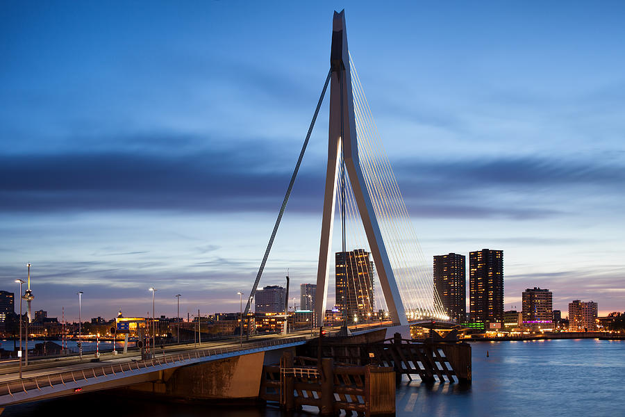Erasmus Bridge and City Skyline of Rotterdam at Dusk Photograph by Artur Bogacki