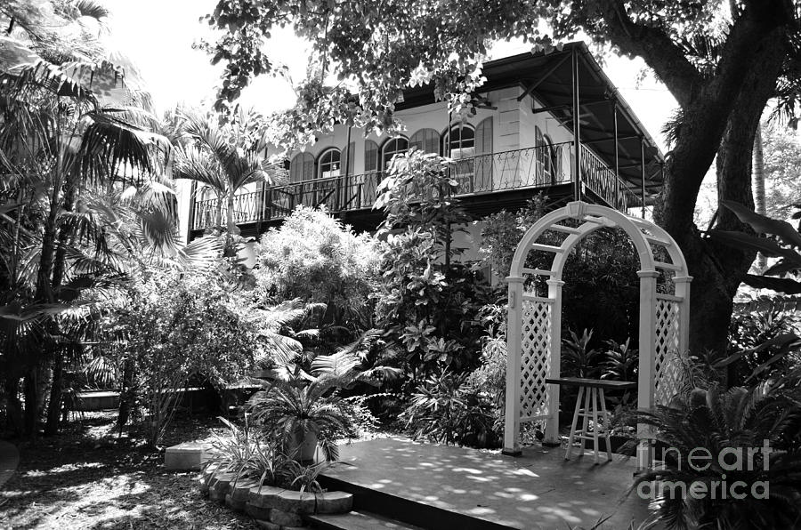 Ernest Hemingway House and Lush Gardens Key West Florida Black and White Photograph by Shawn OBrien