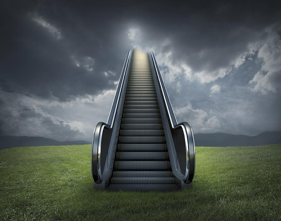 Escalator to cloudy sky in rural landscape Photograph by Chris Clor