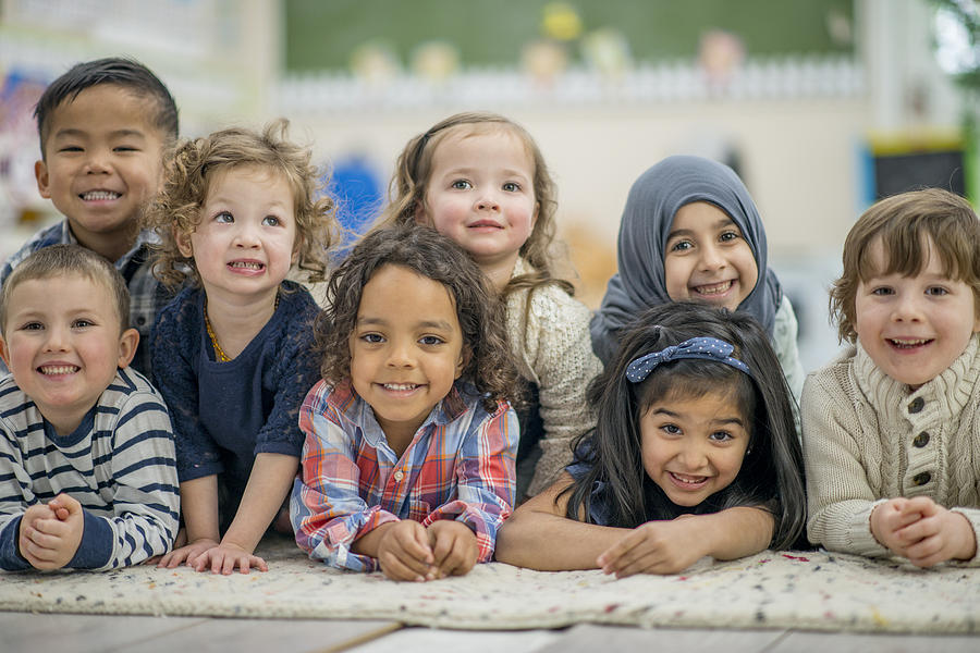 Ethnically Diverse Group of Kids Smiling Portrait Photograph by FatCamera
