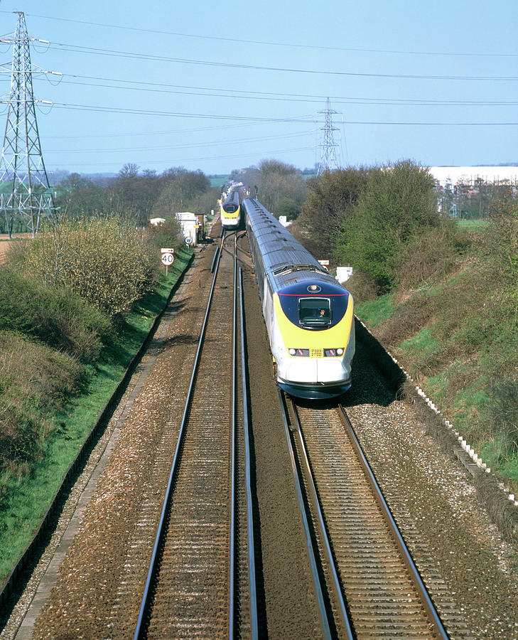 Eurostar Channel Tunnel Trains Passing On A Track Photograph by Martin Bond/science Photo Library
