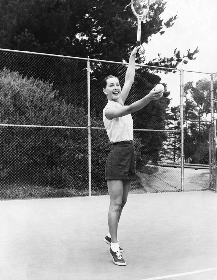 Evelyn Frey Playing Tennis Photograph by Bill Young