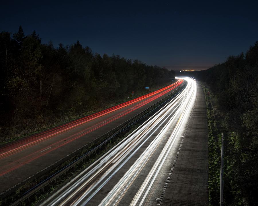 Evening Rush Hour On Motorway Photograph by Robert Brook