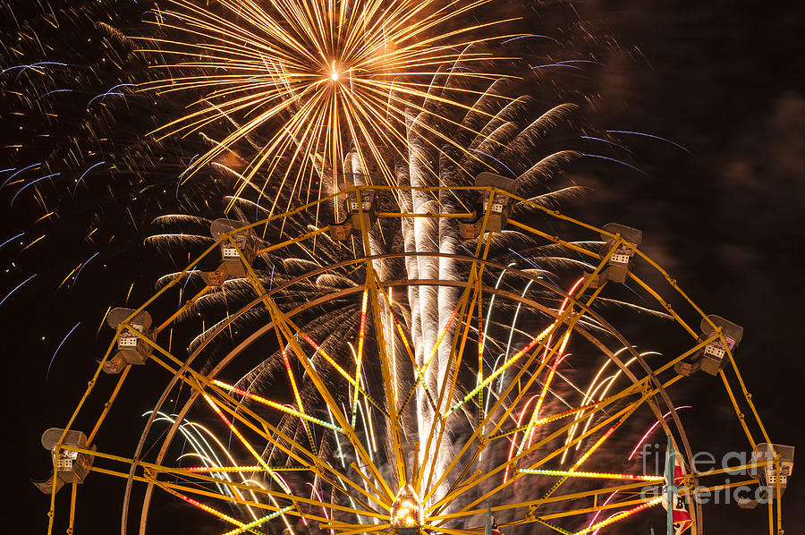 Evergreen State Fair with ferris wheel and fireworks display Photograph