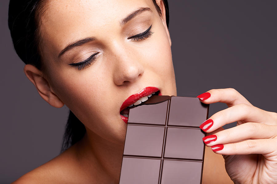 Every woman needs a guilt-free chocolate day Photograph by PeopleImages