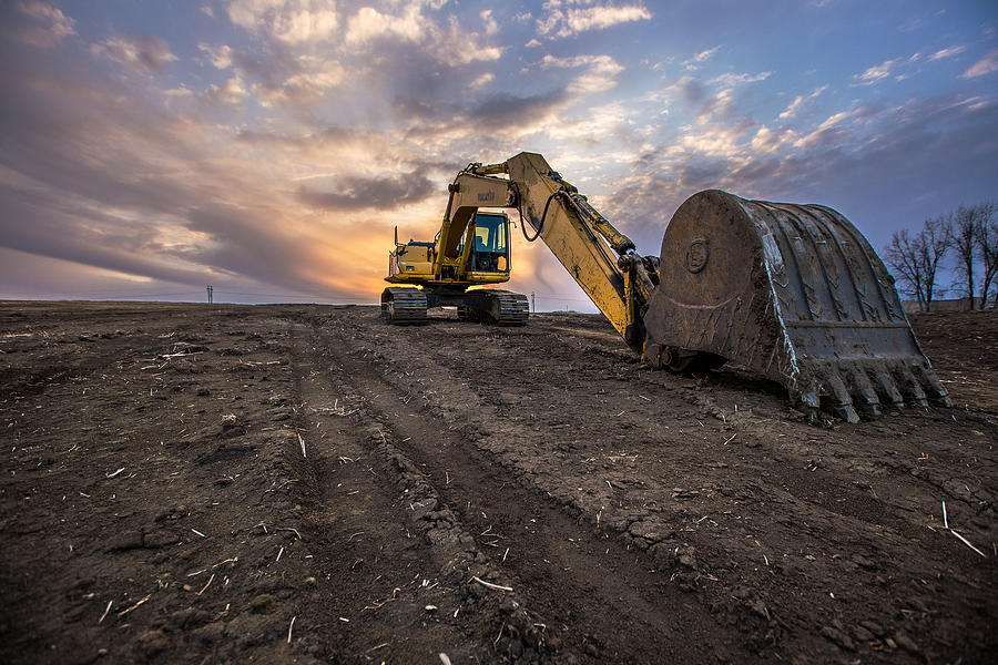 Sunset Photograph - Excavator by Aaron J Groen