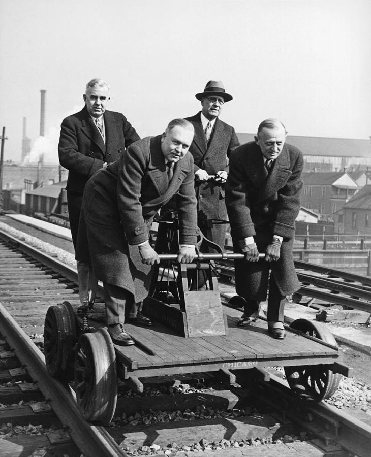 Executives Commute By Handcar Photograph by Underwood Archives