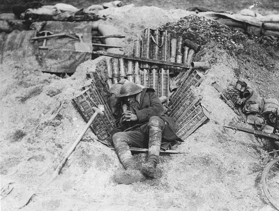 Black And White Photograph - Exhausted WWI Soldier by Underwood Archives