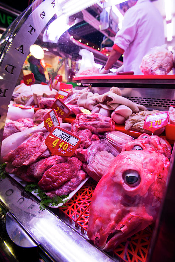 Exotic Meats Sitting In A Deli Case Photograph by Rob Hammer