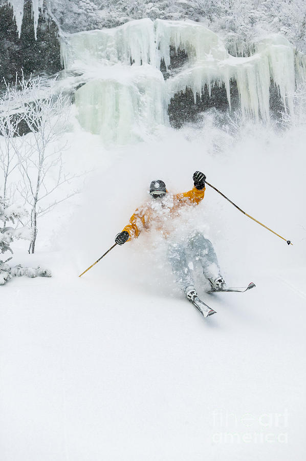 Winter Photograph - Expert skier skiing powder. by Don Landwehrle