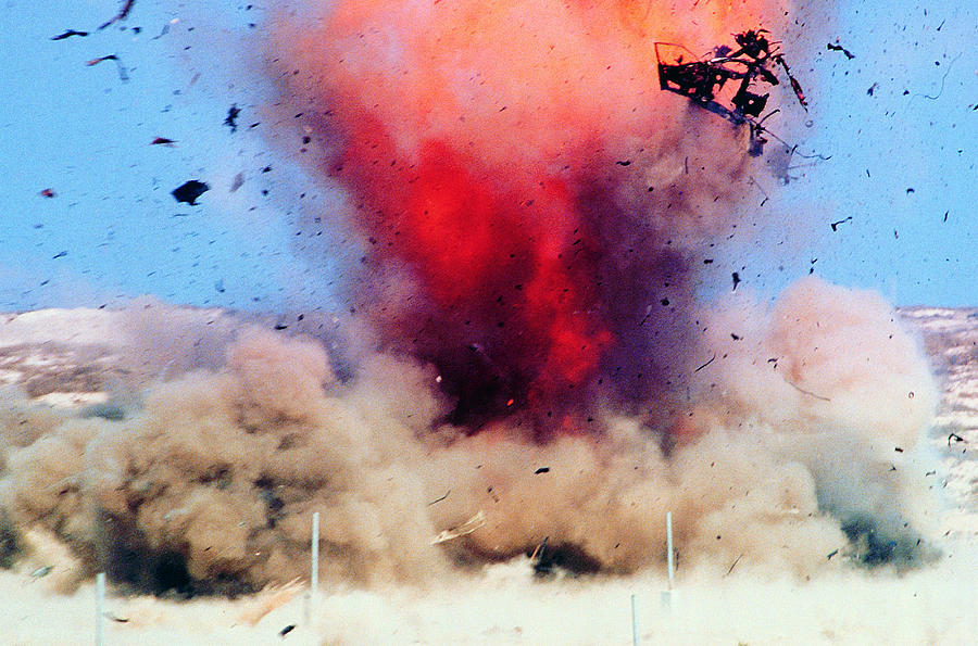 Explosion in desert Photograph by Frank Rossoto Stocktrek