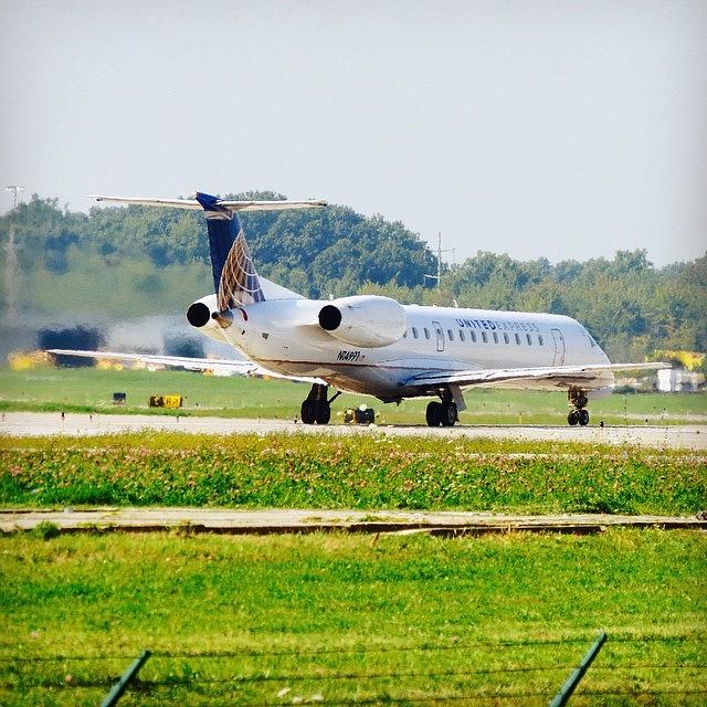 Cleveland Photograph - Expressjet (united Express) Asq4199, An by Harrison Miller